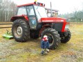 Marek fascinated with a tractor.